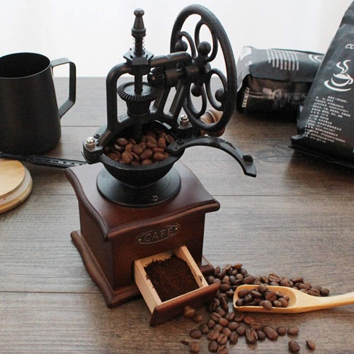 Old fashioned Hand operated manual coffee bean grinder